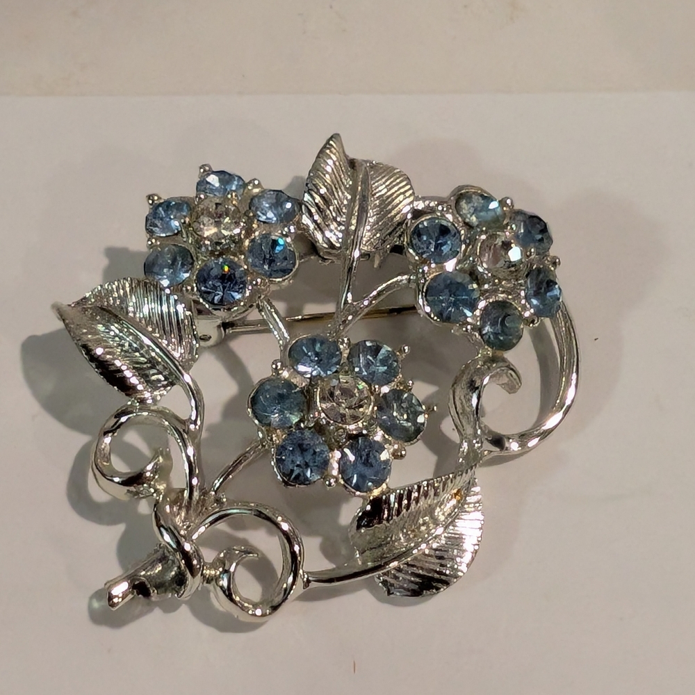 Signed Coro Blue Rhinestone Floral And Leaves Brooch.